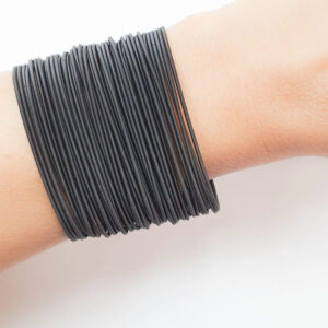 Set of black guitar string bracelets (10 units).