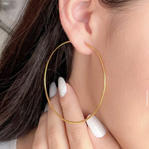 Large thin hoop earring.